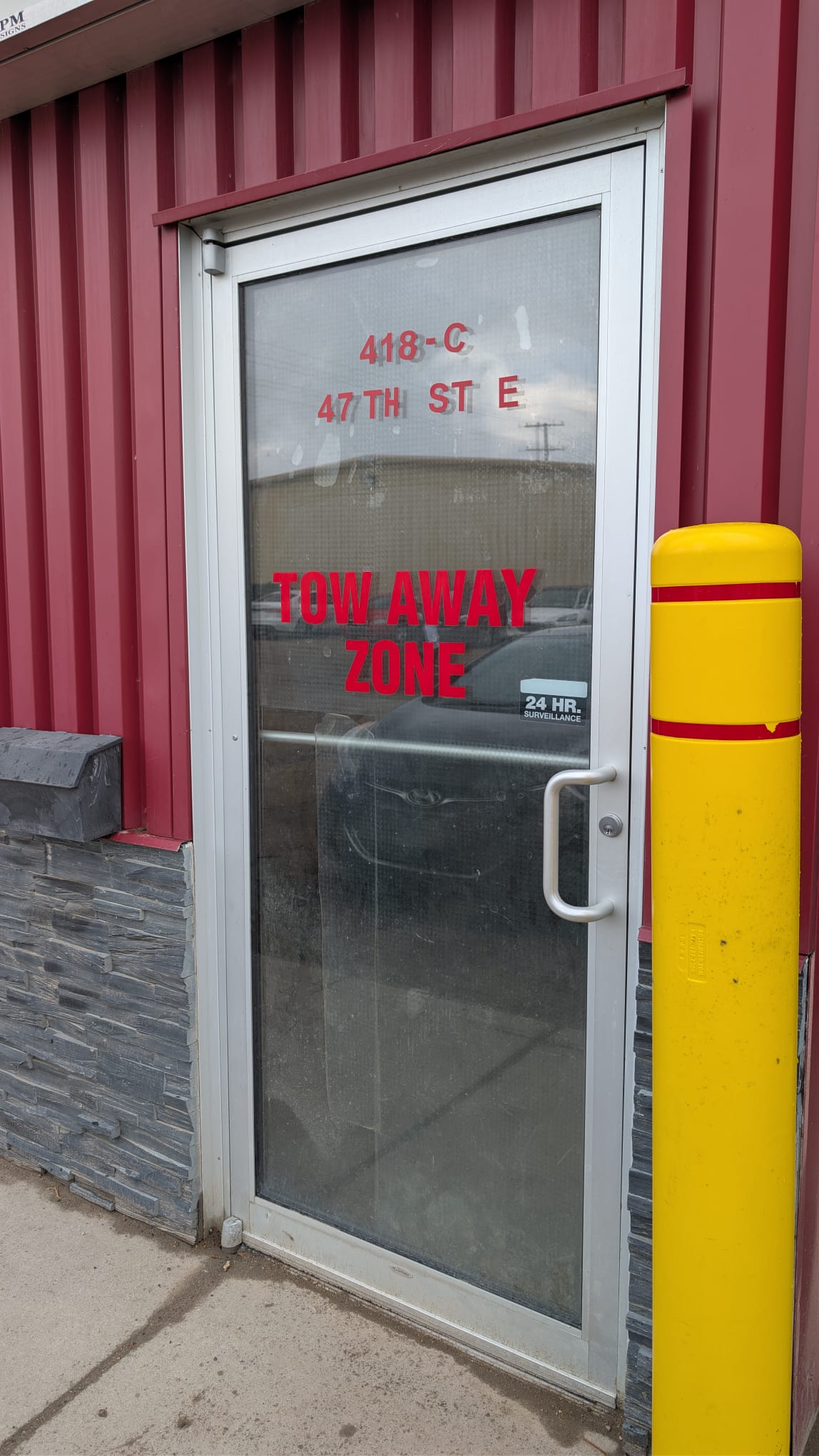 Customer entrance at 418C 47th Street E, Saskatoon — look for the 418-C door